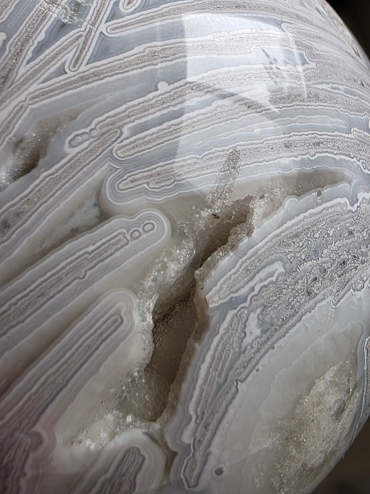 White Mexican Lace Agate Shimmering Druzy UV Reactive on stand